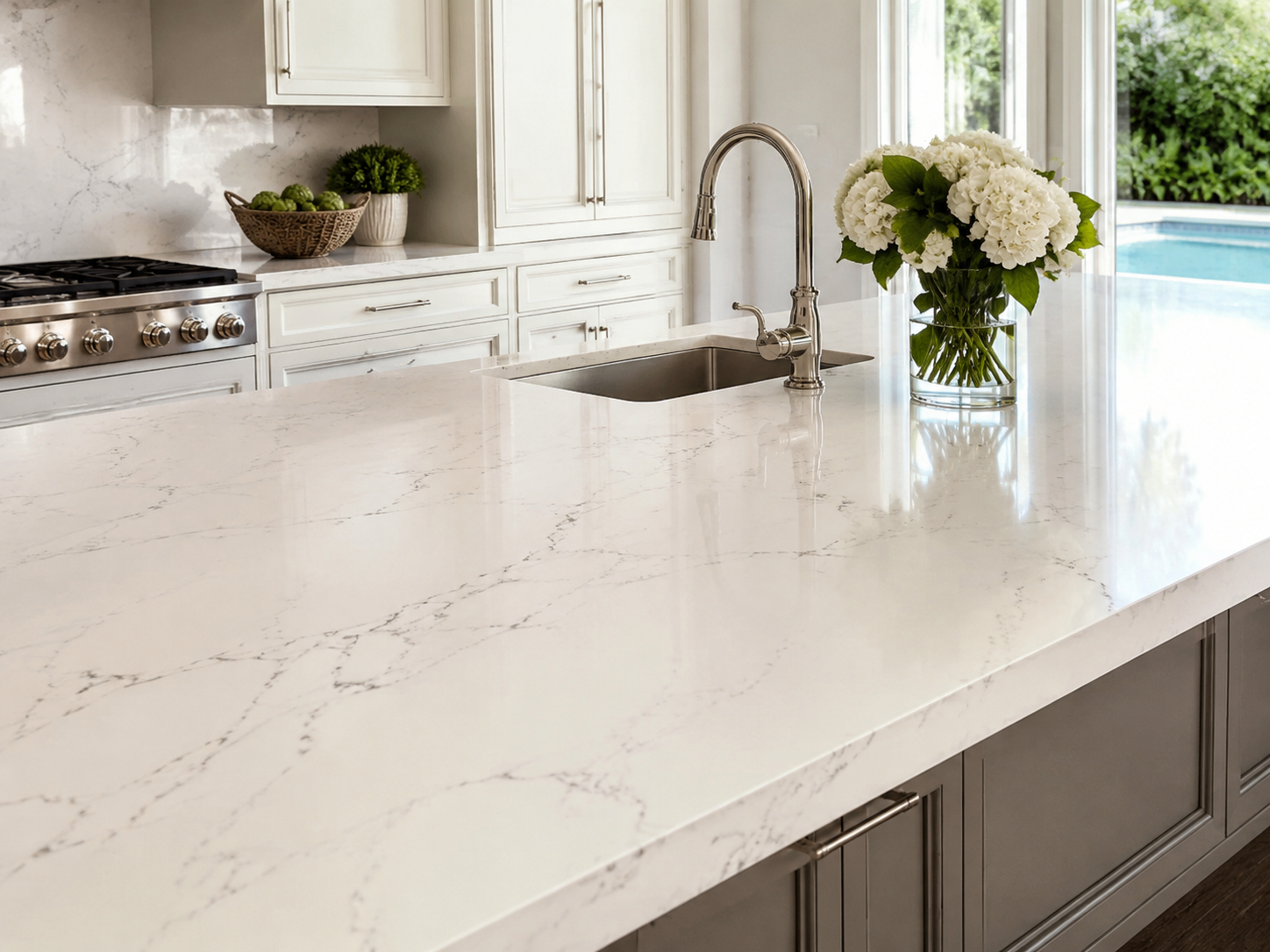 White quartz kitchen island with subtle veining